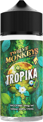 Load image into Gallery viewer, A bottle of Tropika Twelve Monkeys 100ml Shortfill 0mg Nicotine Vape Juice with a colorful label featuring exotic fruits and leaves.