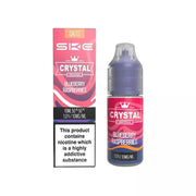 A 10ml bottle of SKE Crystal Blueberry Raspberries e-liquid with a label indicating the product contains nicotine, available in 10mg/20mg strength.