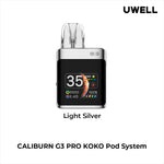 Load image into Gallery viewer, Uwell Caliburn G3 Pro Koko Pod Vape Kit in Light Silver – compact square-shaped vape device with a sleek dark finish, OLED display, and customizable vaping features.
