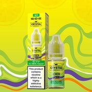 A product image showcasing a 10ml bottle of Lemon & Lime flavor SKE Crystal Nic Salt E Liquid, with a box in the background, placed against a colorful abstract background.