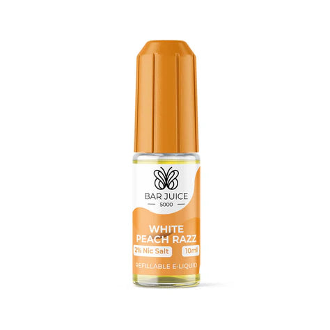 The image shows a product packaging for Bar Juice 5000 White Peach Razz Vape juice. The packaging is primarily orange and white with text and branding, including a schematic of a vaping device.