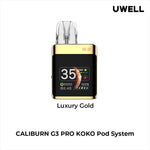 Load image into Gallery viewer, Uwell Caliburn G3 Pro Koko Pod Vape Kit in Luxury Gold – compact square-shaped vape device with a sleek dark finish, OLED display, and customizable vaping features.
