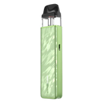 Load image into Gallery viewer, Vaporesso XROS 5 Mini Pod Kit in Flowing Green – ultra-compact vape device with sleek design, reliable performance, and smooth draw activation.
